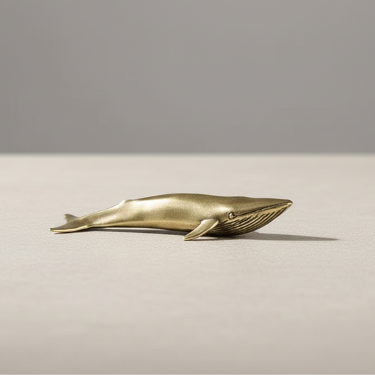 Brass Blue Whale sculpture on white background – handcrafted coastal decor by Kiyo Home