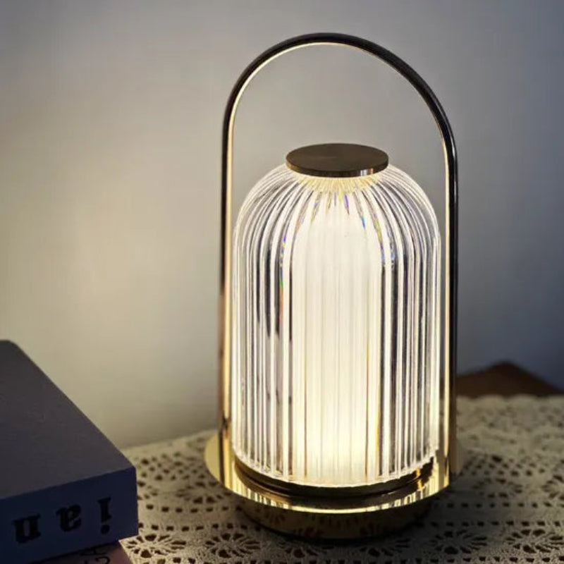 Decorative lamp with a ribbed design on a table
