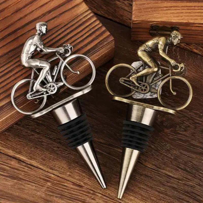 A unique cyclist bottle stopper featuring a detailed cyclist figurine, adding a fun touch to any wine bottle.