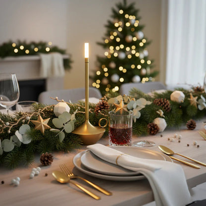 Decorated table with Christmas tree and garland in a festive setting