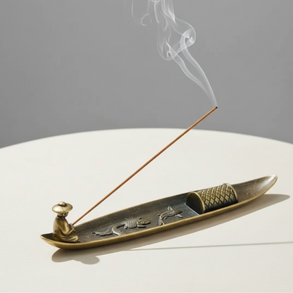 Fishing incense burner with fisherman figurine and smoke trail – handcrafted ceramic decor by Kiyo Home