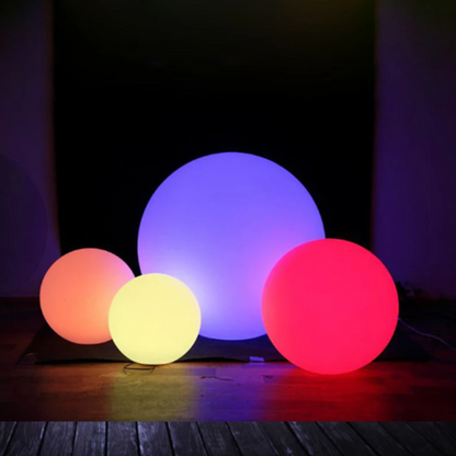 Colorful garden ball lights enhancing the beauty of outdoor spaces at night.