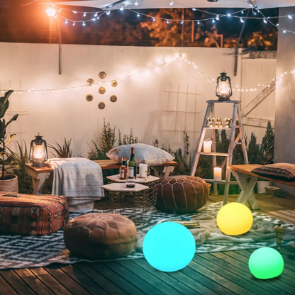 Glow-in-the-dark garden ball lights adding a decorative touch to the backyard