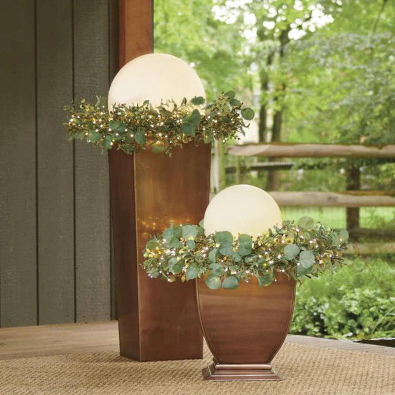 Softly glowing garden ball lights bringing a peaceful vibe to your outdoor space.