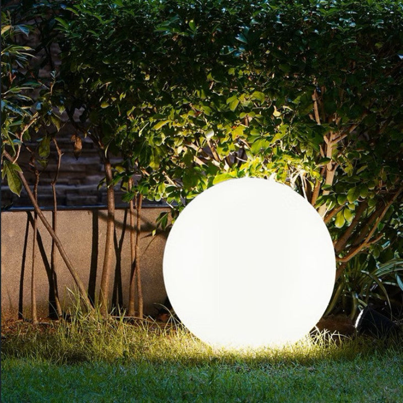 Stylish garden ball lights illuminating pathways and garden decor.