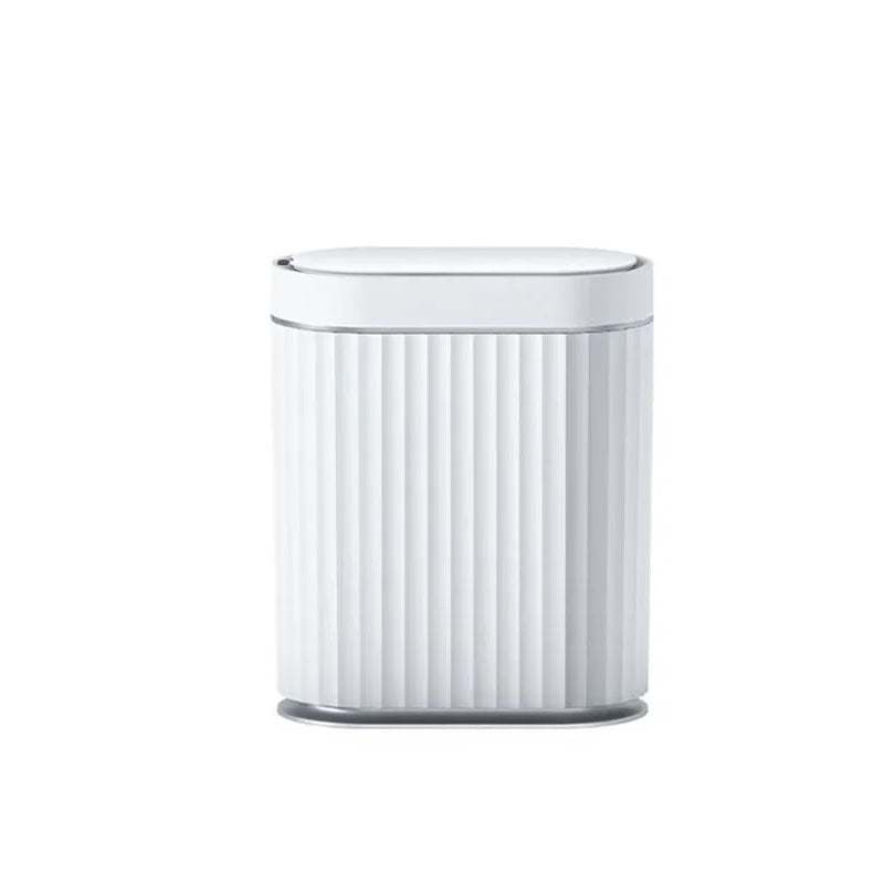 Modern, oval, white smart trash can with vertical fluting and grey trim.
