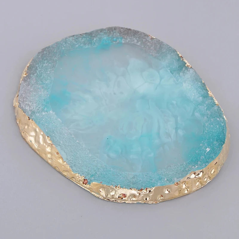 Close-up of a blue resin coaster, featuring a smooth, glossy finish and vibrant color, perfect for adding a chic, modern touch to your home decor.