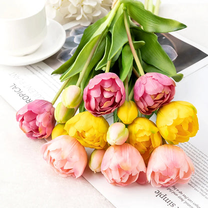 Parrot faux silicone tulips in assorted colors on white surface