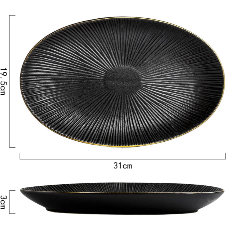 A top-down and side view of a black oval ceramic plate with a ridged texture and gold rim, showing its dimensions of 31cm in length, 19.5cm in width, and 3cm in height.