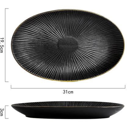 A top-down and side view of a black oval ceramic plate with a ridged texture and gold rim, showing its dimensions of 31cm in length, 19.5cm in width, and 3cm in height.
