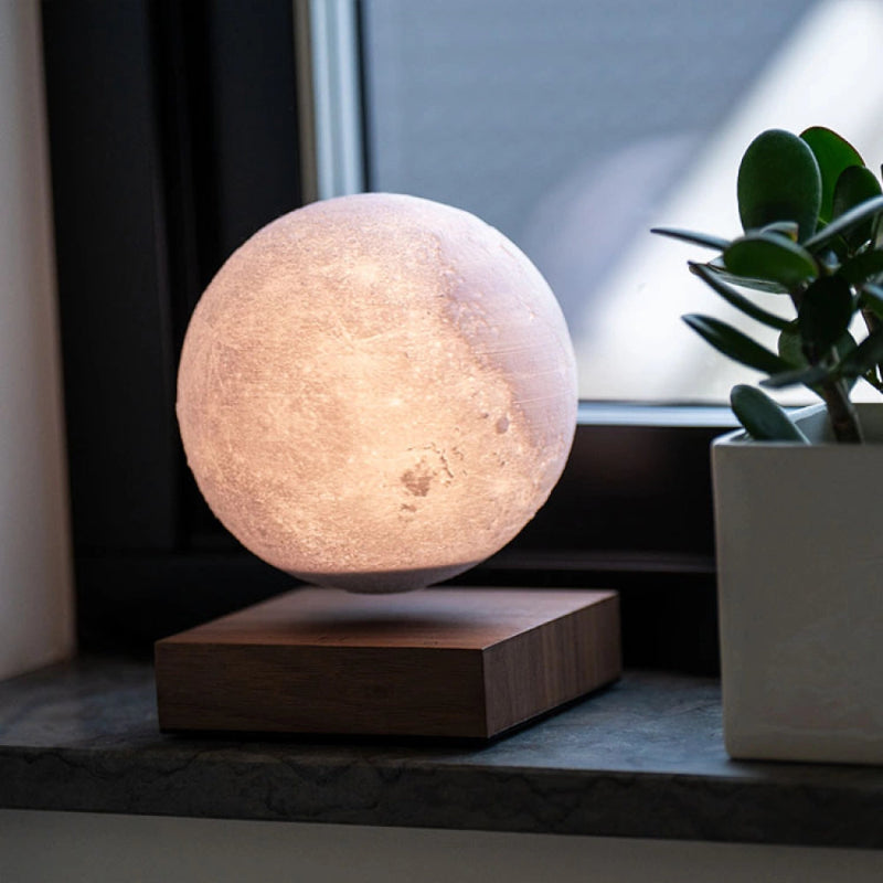 Elegant levitating moon lamp hovering effortlessly, perfect for unique home decor.