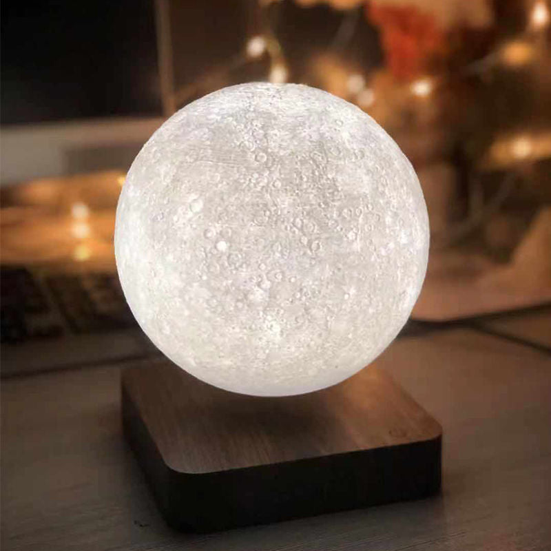 Levitating moon lamp with a futuristic design, blending innovation and elegance.