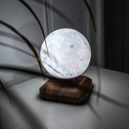 Levitating moon lamp with a minimalist design, combining technology and art.