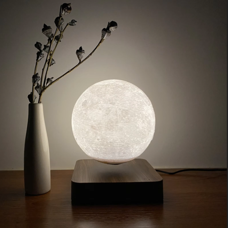 Levitating moon lamp floating gracefully, casting a soft, celestial glow.