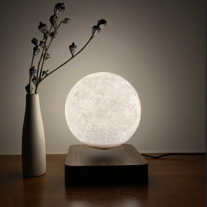 Levitating moon lamp floating gracefully, casting a soft, celestial glow.