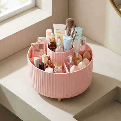 Pink round rotating makeup organizer for everyday makeup storage.