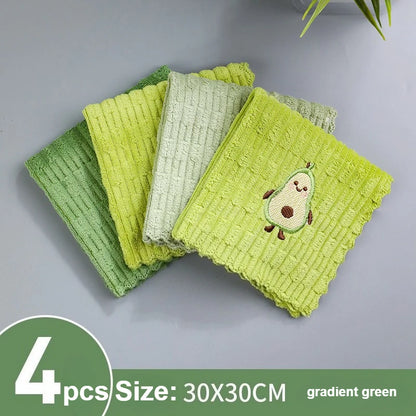 Four green textured dishcloths with a gradient effect on a gray background.