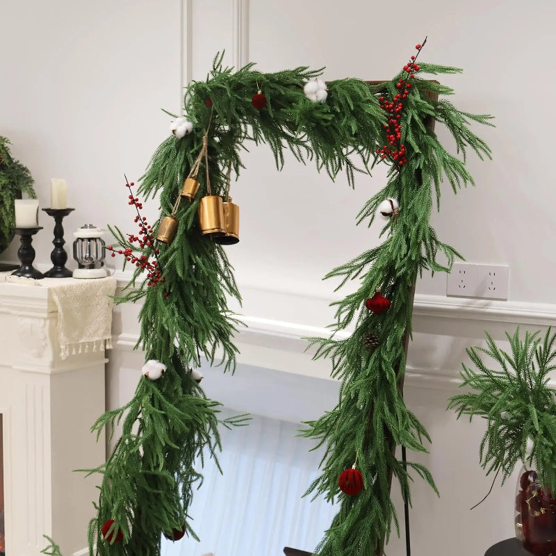 A decorated green garland arch.