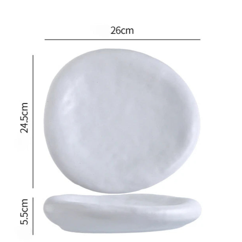 Measurement chart of a white stone with dimensions labeled on a white background