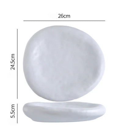 Measurement chart of a white stone with dimensions labeled on a white background