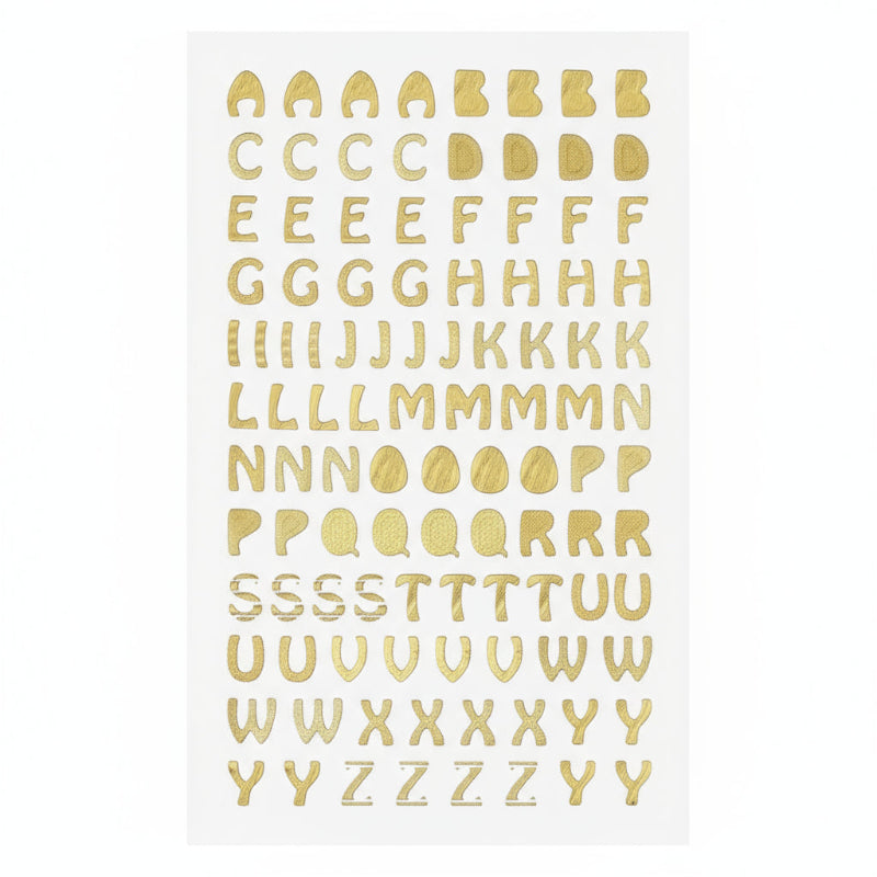 Sheet of gold letter stickers on a white background