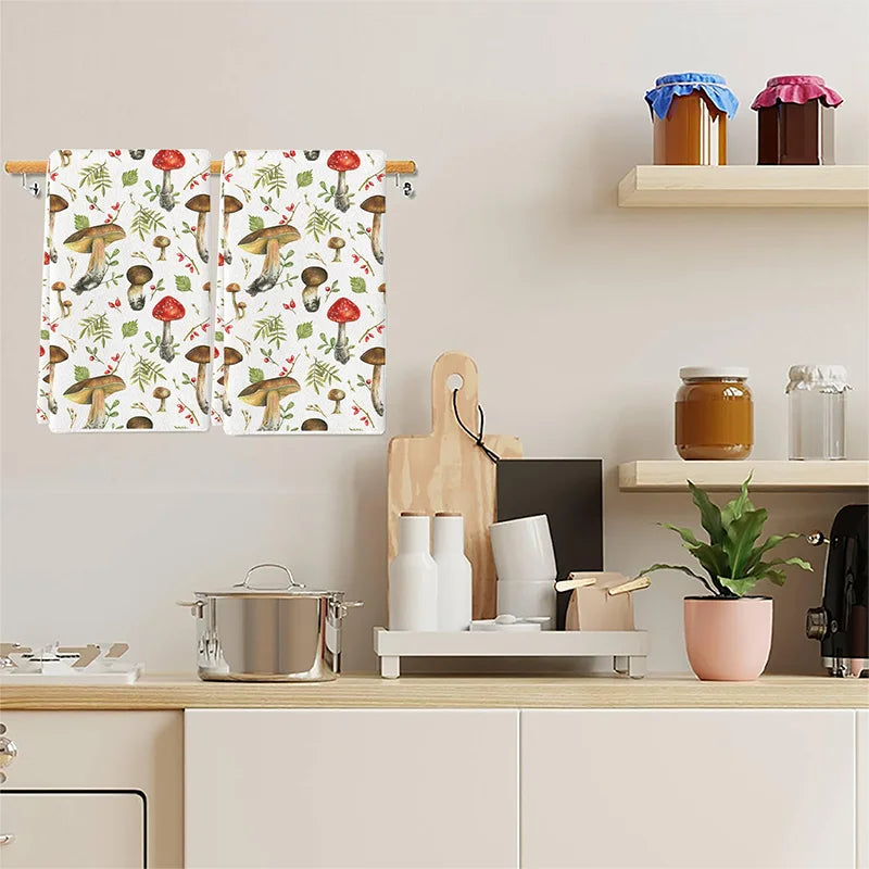 Kitchen counter with a mushroom-patterned towel, cutting board, and jars.