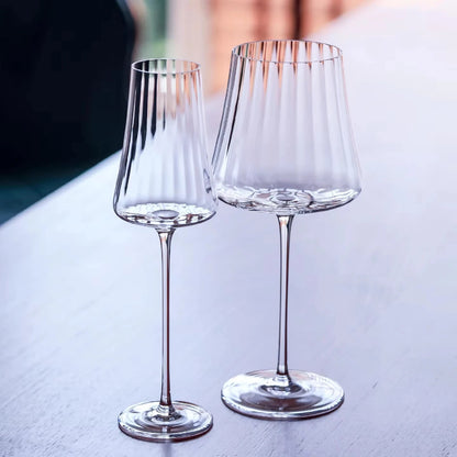 Two fluted wine glasses.