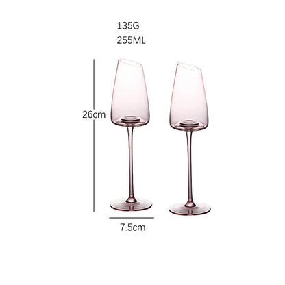 A graphic of two empty, narrow wine glasses with pink stems and an angled rim, showing their dimensions and volume.
