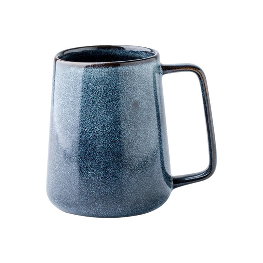 A ceramic mug with a textured blue glaze and a modern, angular handle. The mug has a slightly tapered shape, wider at the base and narrower at the top, with a glossy finish.