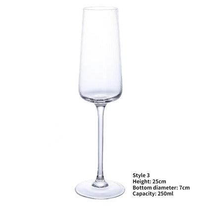 A single, empty champagne flute with a ribbed design on the bowl, a long stem, and a round base. The dimensions and capacity are listed in the bottom right corner.