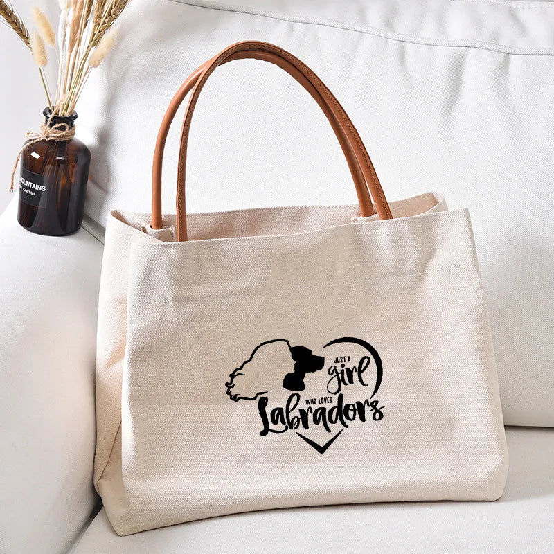 Canvas tote bag with a "Just a girl who loves Labradors" graphic.