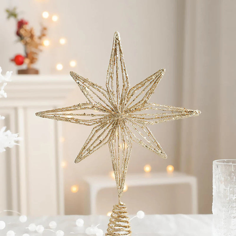 Gold glitter wire star Christmas tree topper.