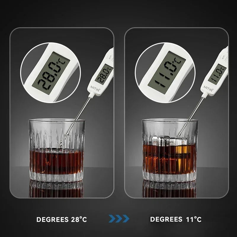 Digital thermometer showing temperature difference between two glasses of liquid.