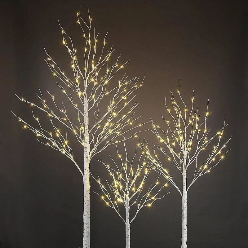 Decorative trees with lights on a dark background