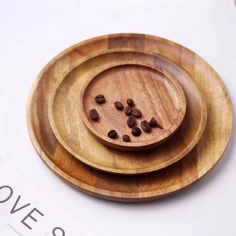 Nested wooden plates with coffee beans.