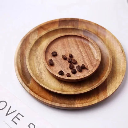 Nested wooden plates with coffee beans.