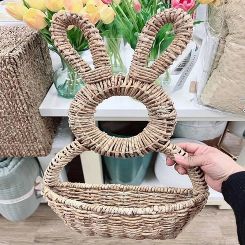 Woven bunny wall basket shown being held by hand