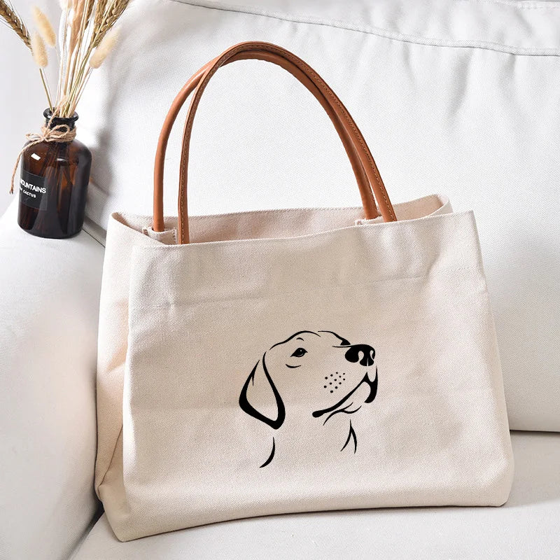 Canvas tote bag with a labrador outline.