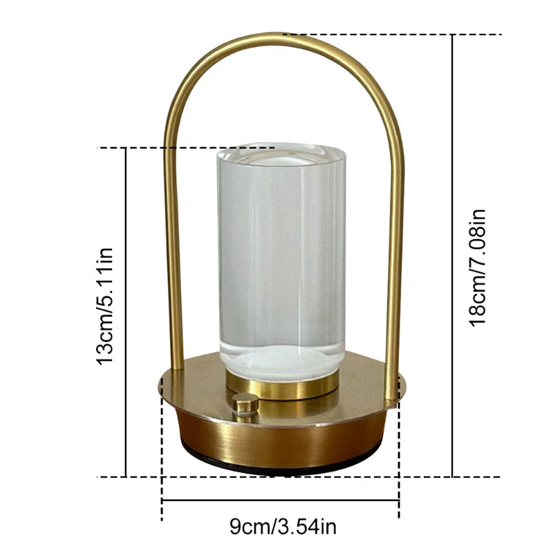 
A single portable lamp with a gold metal frame and a glass shade, showing its dimensions: 18cm tall, 13cm tall to the top of the glass, and a 9cm diameter base.