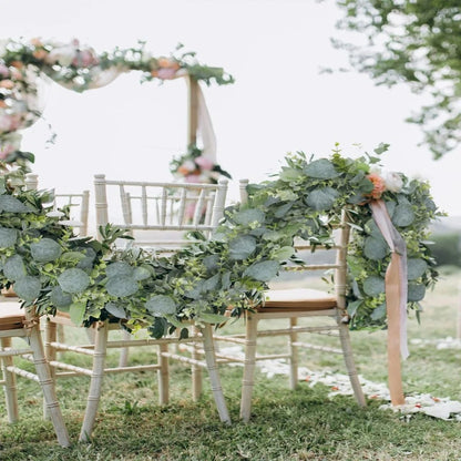 Eucalyptus garland enhancing an event backdrop, demonstrating its perfect fit for weddings, parties, or other special occasions, adding natural elegance to any setting.