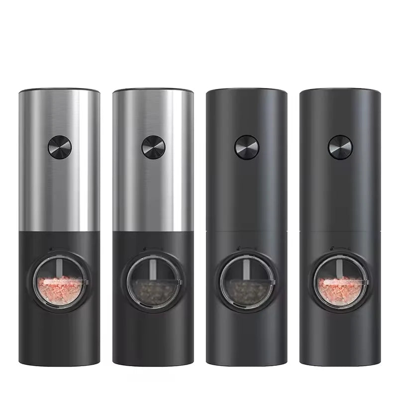 Four automatic spice grinders in a row: two with silver tops filled with pink salt, and two with black tops filled with black peppercorns.