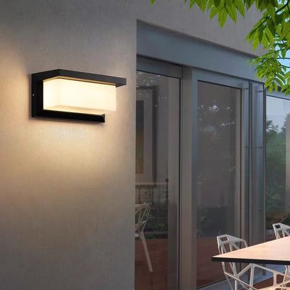 The Arya Motion Sensor Light positioned in a garden, using radar sensor technology to provide automatic, motion-activated illumination. Weather-resistant and efficient, it ensures security and lighting even during outdoor conditions.