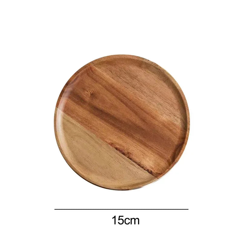 A round wooden plate with a diagonal two-toned grain pattern, and its diameter of 15 cm indicated below it.
