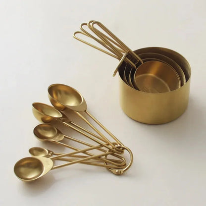 A full set of measuring cups and spoons.