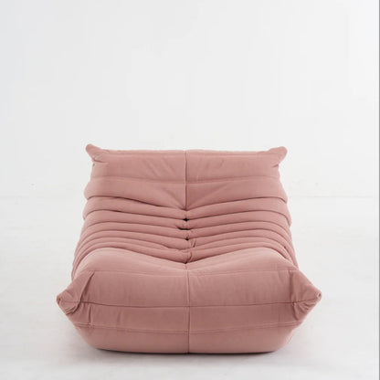 Front view of a pink modern lounge chair.