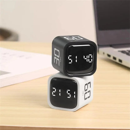 Smart productivity cube timer for efficient time management.