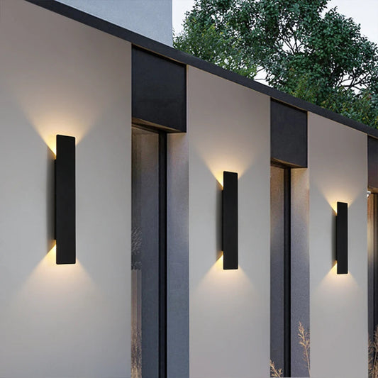 Modern black outdoor LED wall light with waterproof design.