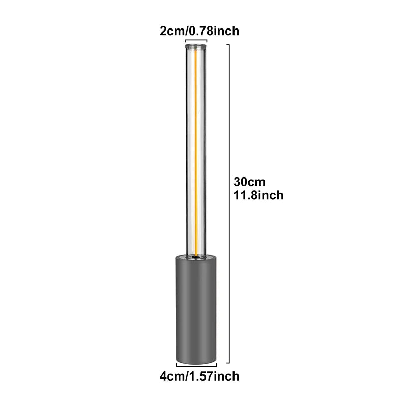 A diagram of a small, silver cylindrical lamp with a glowing tube, showing its dimensions: 30cm tall, with a 4cm diameter base and a 2cm diameter tube.