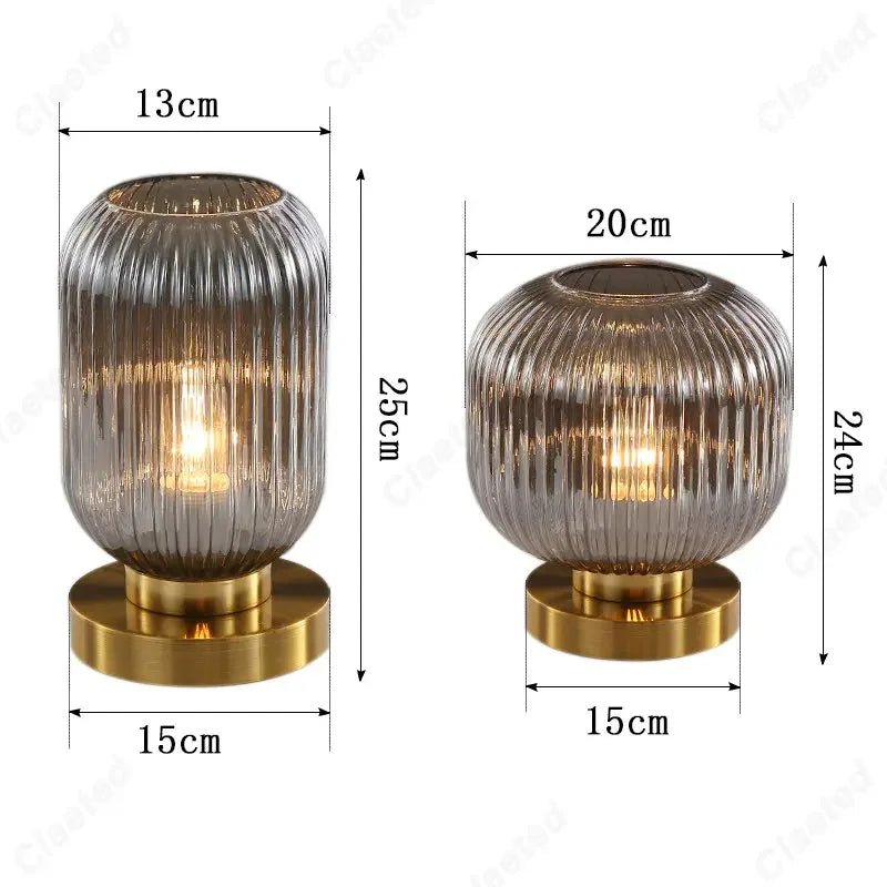 Dimensions of two lit glass lamps with gold bases: the left one is taller and narrower (25cm height, 13cm top diameter, 15cm base diameter), while the right one is shorter and wider (24cm height, 20cm top diameter, 15cm base diameter).