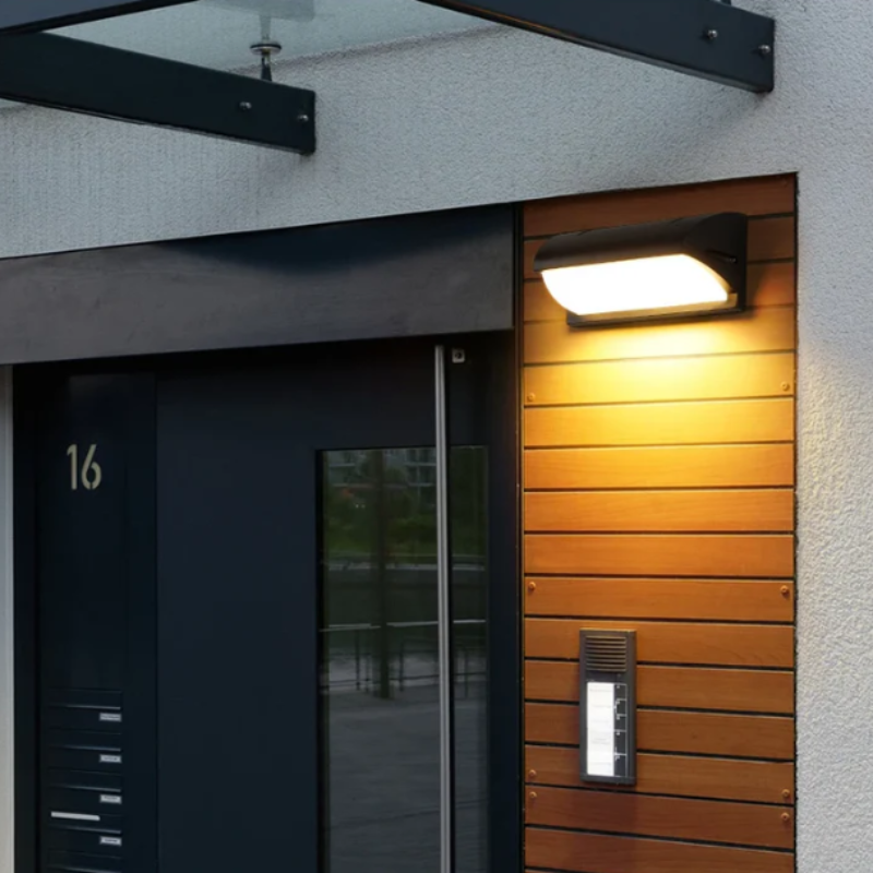 Close-up of the Arya Motion Sensor Light, showing its sleek design and surface mount installation. With easy installation and its weather-resistant build, this light is perfect for outdoor use in any climate.